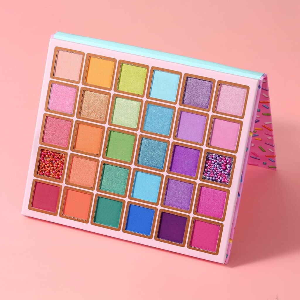 Cloudy With a Chance of Sprinkles eyeshadow palette featuring colorful pastel, bright matte, and shimmer shades arranged in a rainbow-inspired color story.